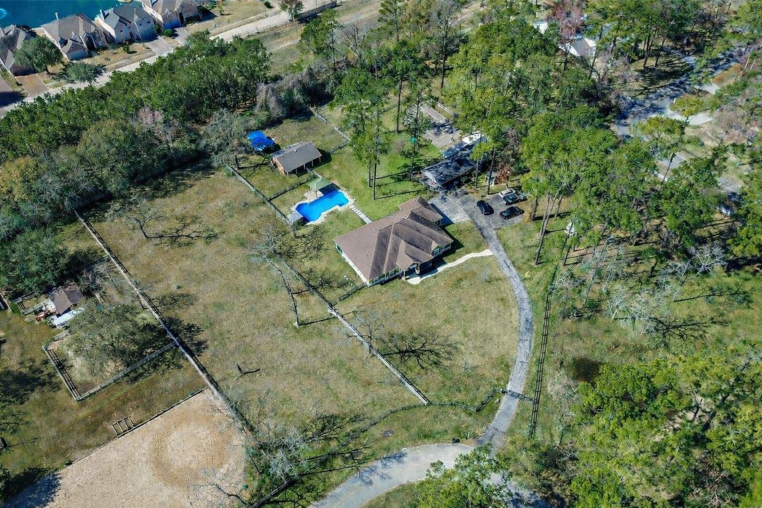 13327 Little Ranch Road Cypress, TX 77429 - Photo 49 of 49 Additional usable land extends beyond the fenced area, offering added flexibility and potential for a variety of uses.