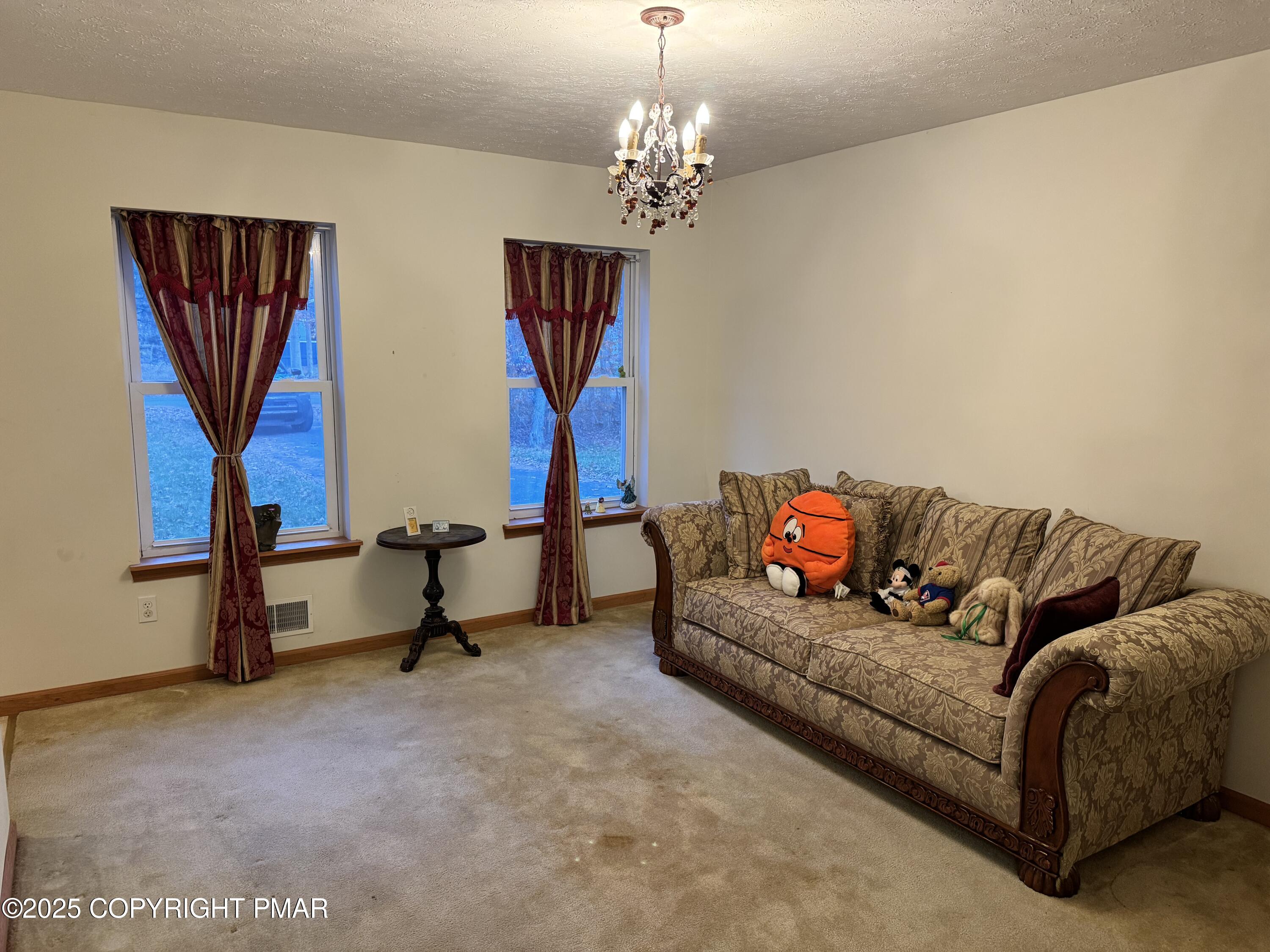 1145 Chickadee Drive Pocono Summit, PA 18346 - Photo 12 of 28 Living Room