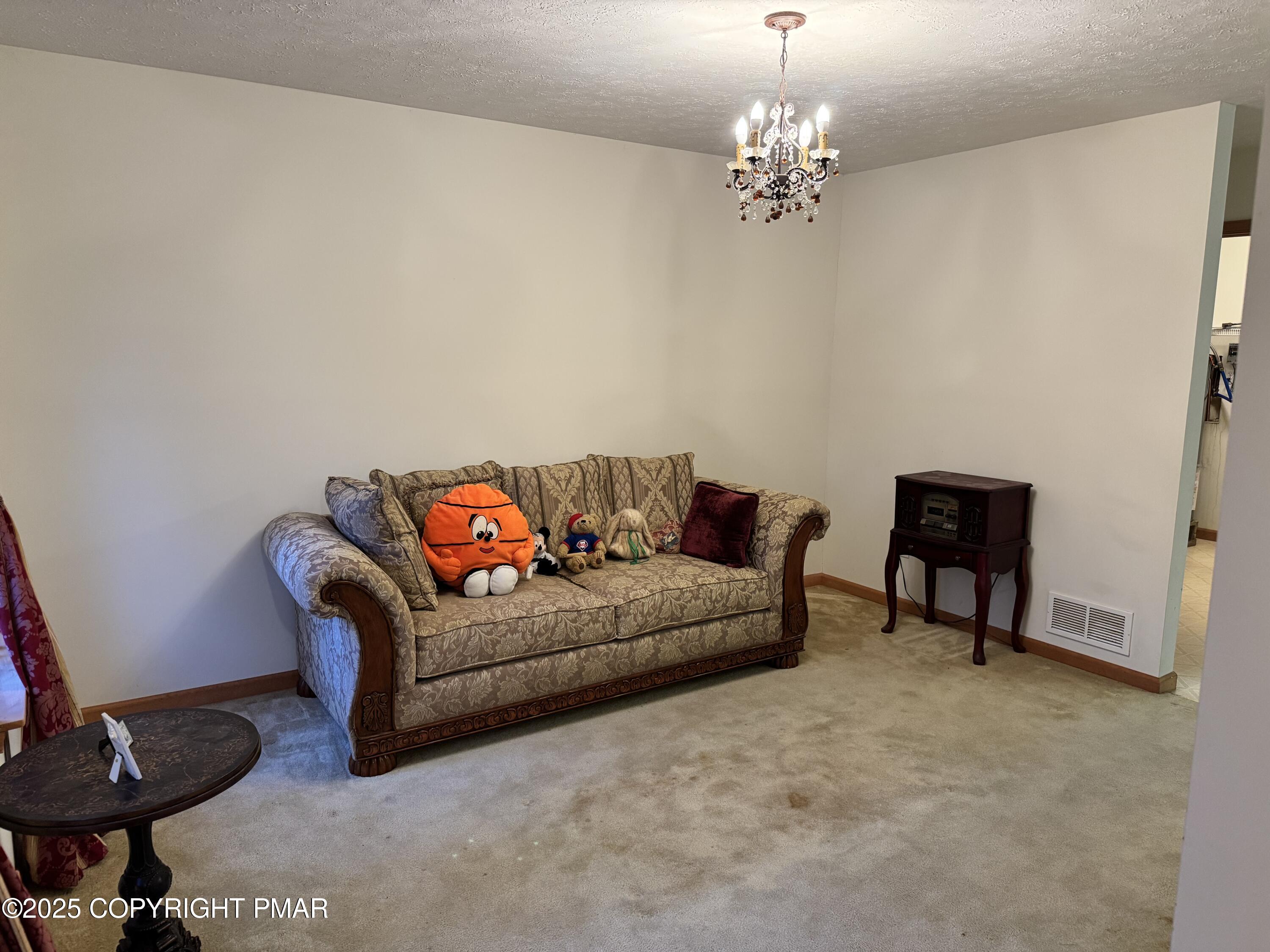 1145 Chickadee Drive Pocono Summit, PA 18346 - Photo 13 of 28 Living Room 2