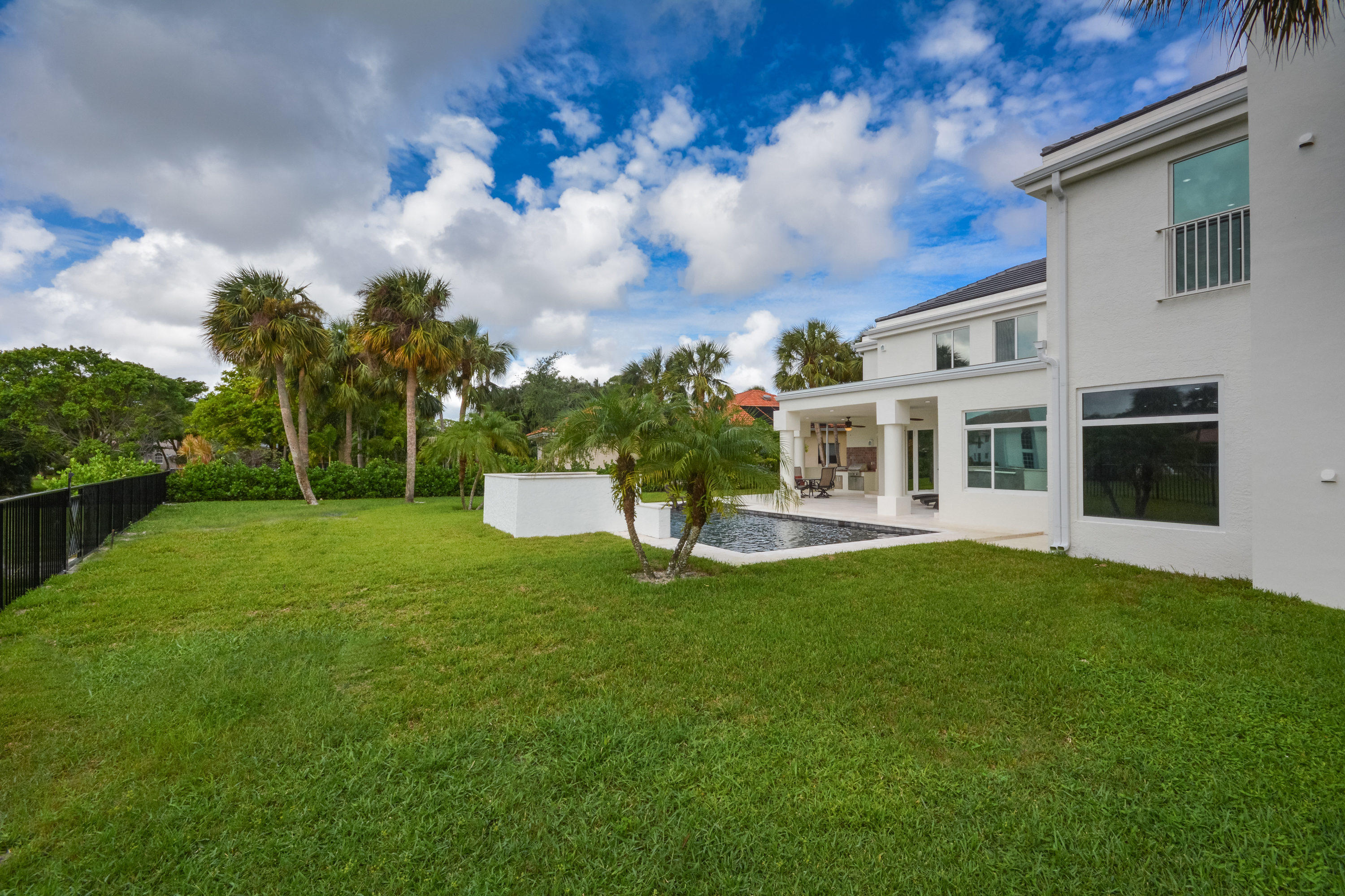 1041 Southwest 21st Avenue Boca Raton, FL 33486 - Photo 46 of 67 a house view with a garden space