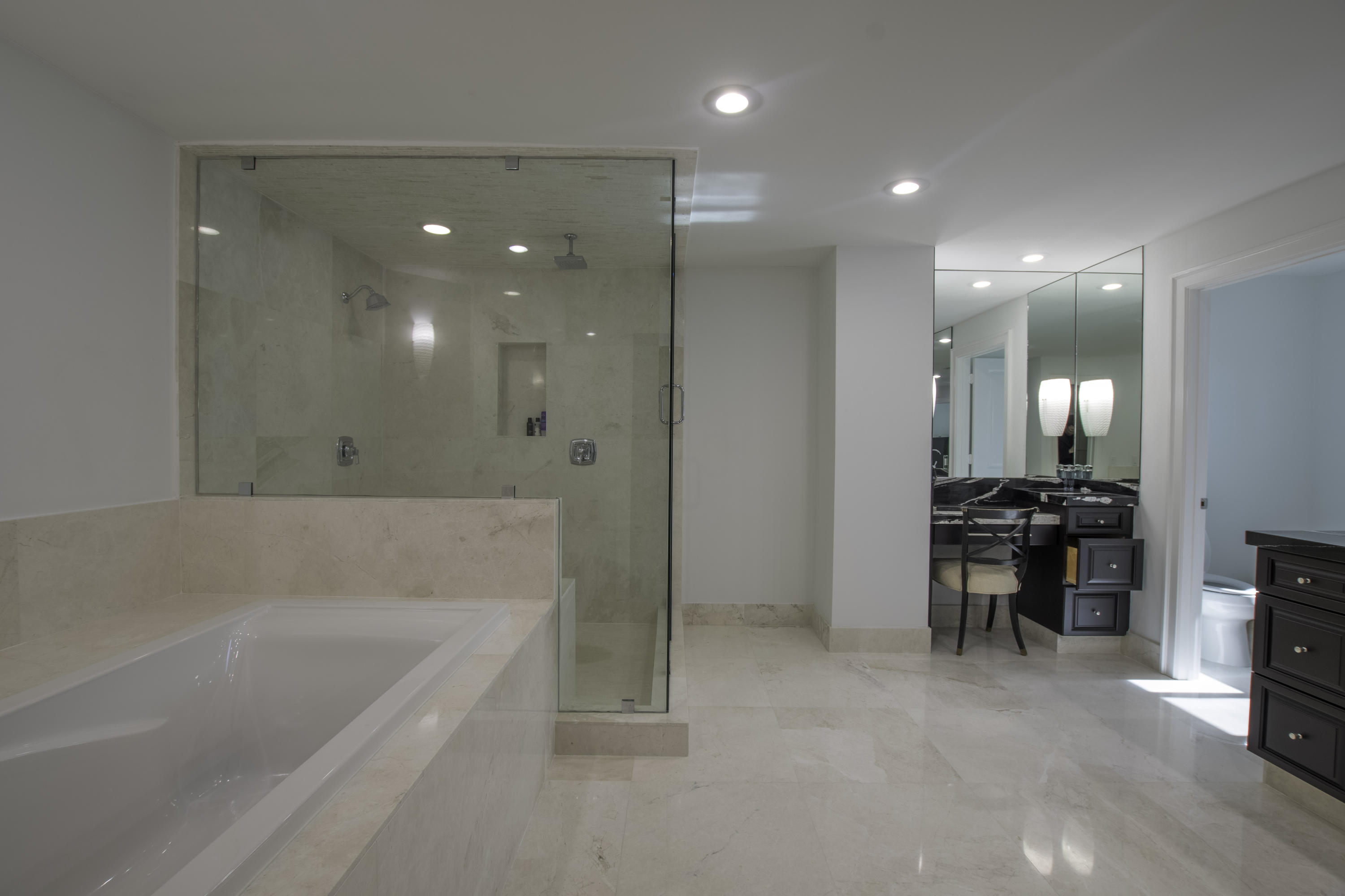 1041 Southwest 21st Avenue Boca Raton, FL 33486 - Photo 62 of 67 a bathroom with a bathtub and a shower