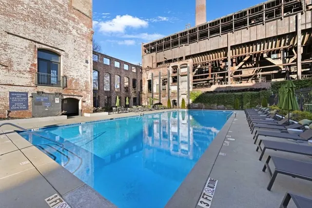 a view of a building with a swimming pool