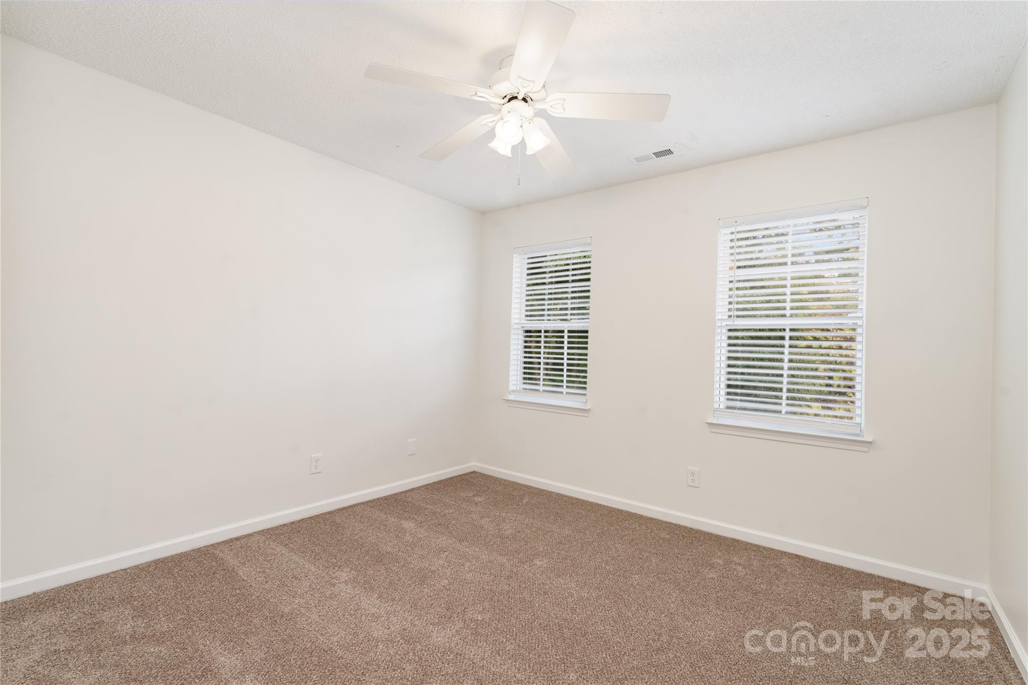 11422 Ridge Oak Drive Charlotte, NC 28273 - Photo 12 of 19 a view of an empty room with a window