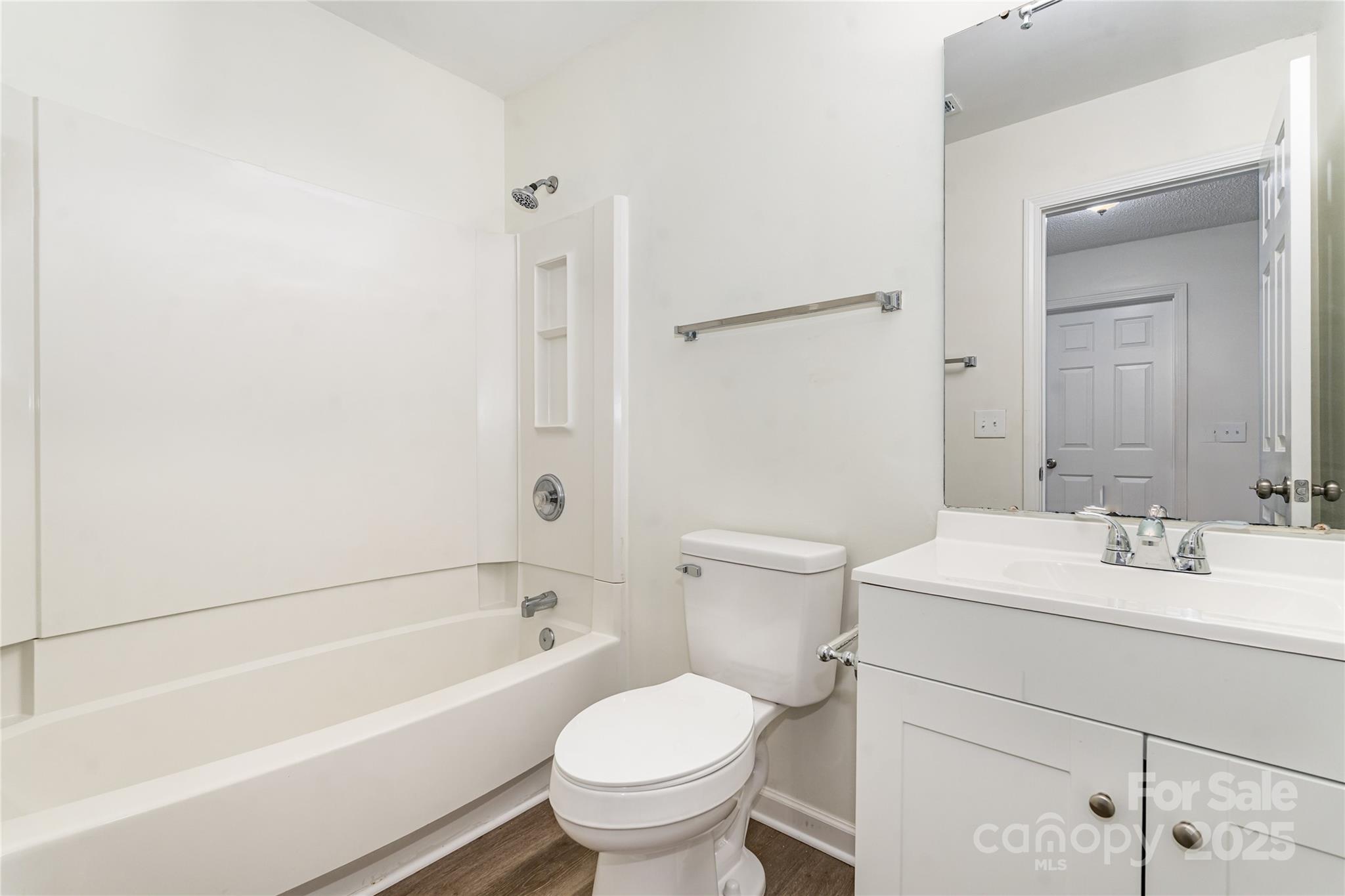 11422 Ridge Oak Drive Charlotte, NC 28273 - Photo 15 of 19 a bathroom with a sink toilet and shower