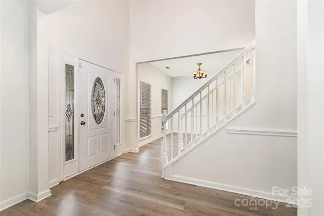a view of entryway with wooden floor