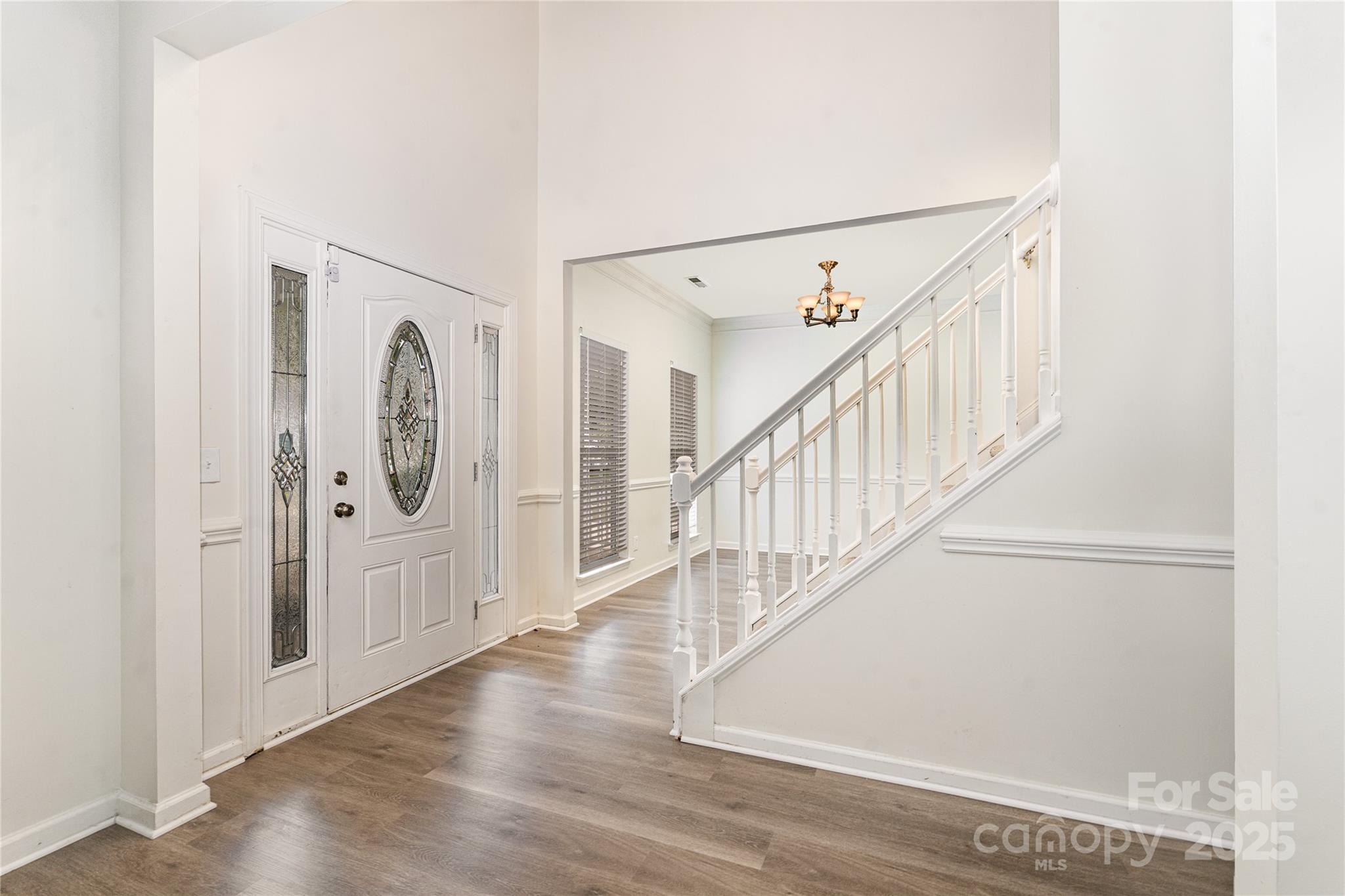 11422 Ridge Oak Drive Charlotte, NC 28273 - Photo 3 of 19 a view of entryway with wooden floor