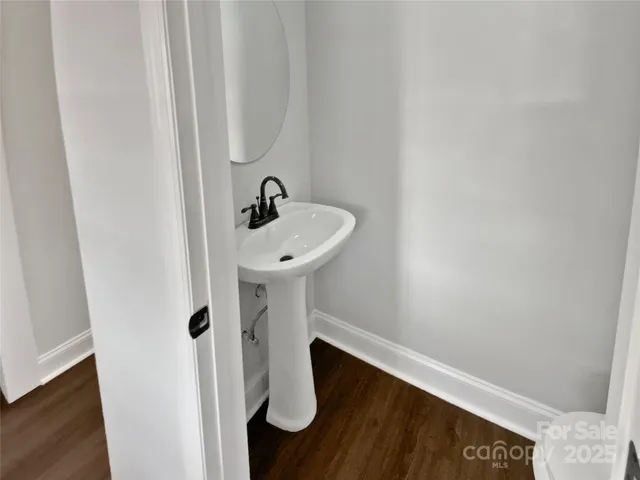a bathroom with a sink and mirror