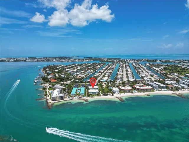 a view of a swimming pool with outdoor seating