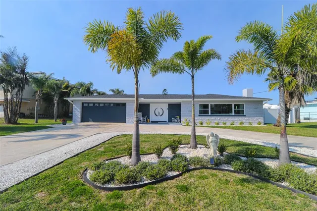an outdoor sitting area with furniture