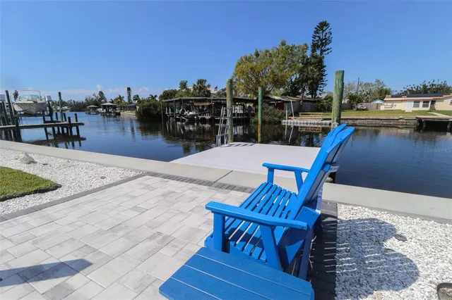 a view of a chairs and table in the terrace