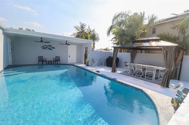 a living room with furniture and a couch