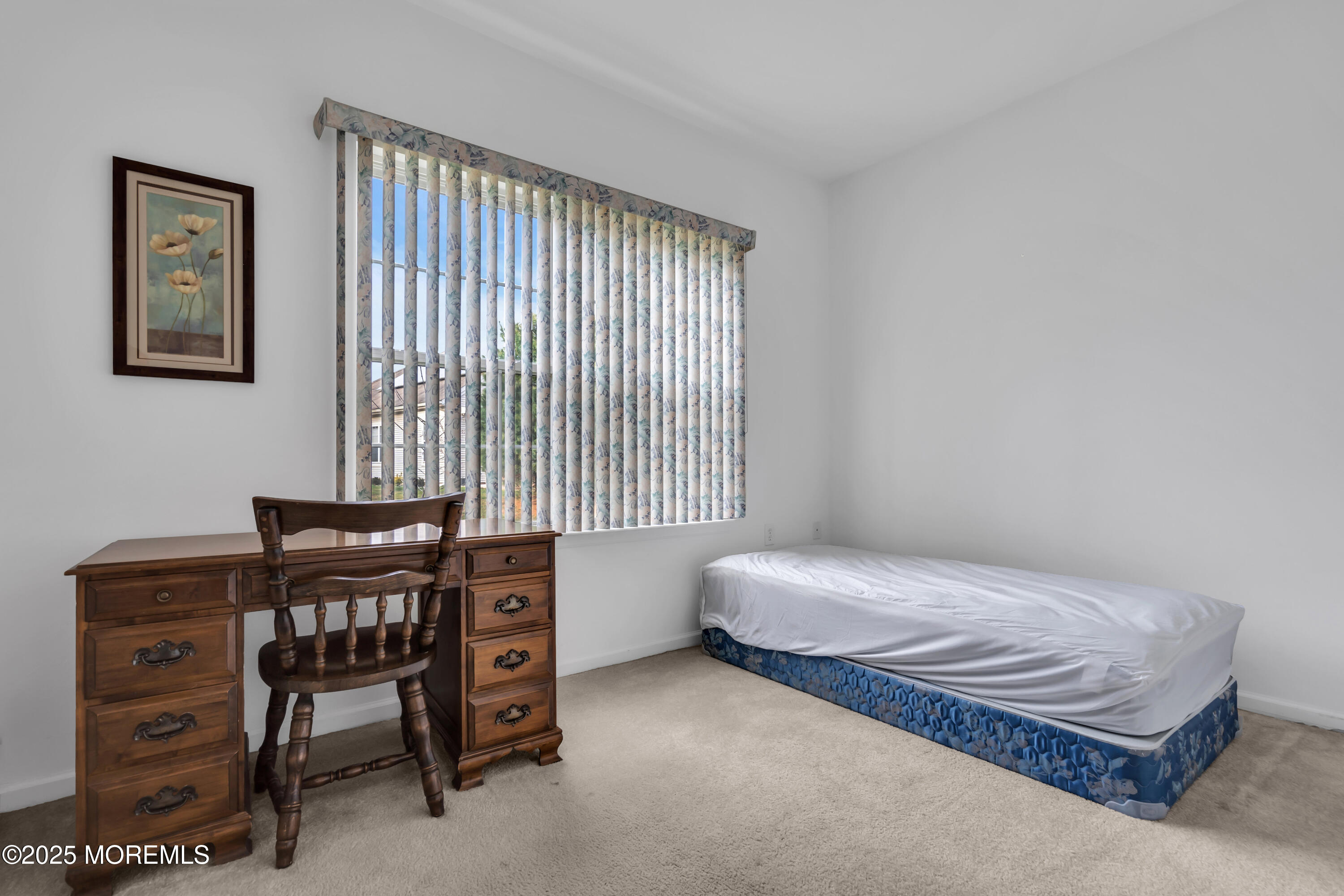 59 Drayton Road Manchester Township, NJ 08759 - Photo 16 of 38 a bedroom with a bed and a window