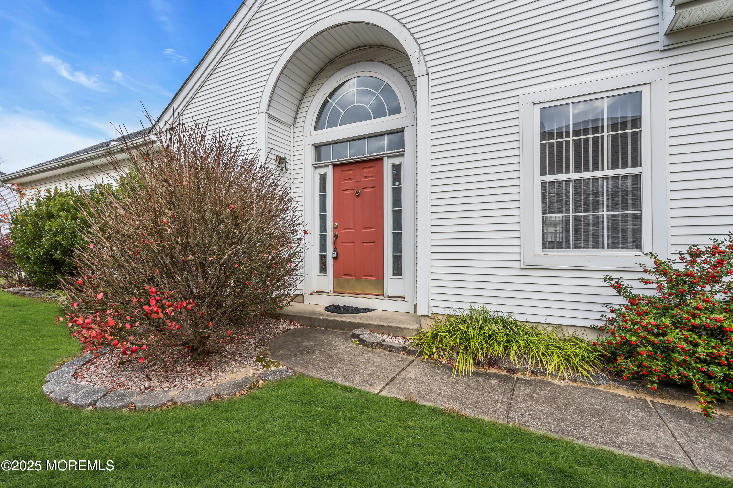 59 Drayton Road Manchester Township, NJ 08759 - Photo 5 of 38 a front view of a house with a garden