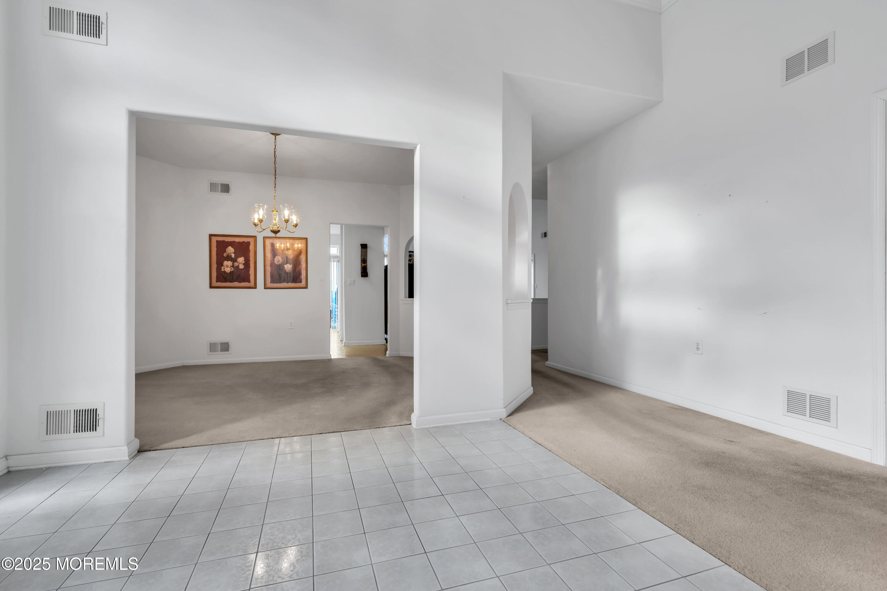 59 Drayton Road Manchester Township, NJ 08759 - Photo 7 of 38 an empty room with a empty space and windows