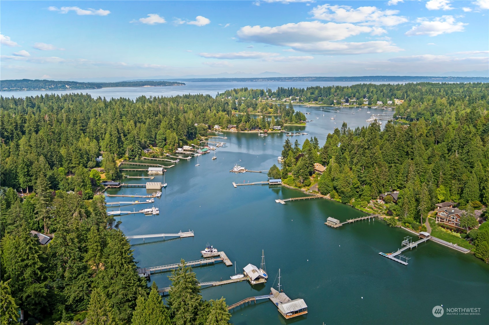 8100 Northeast Hidden Cove Road Bainbridge Island, WA 98110 - Photo 36 of 37 a view of a lake with a city