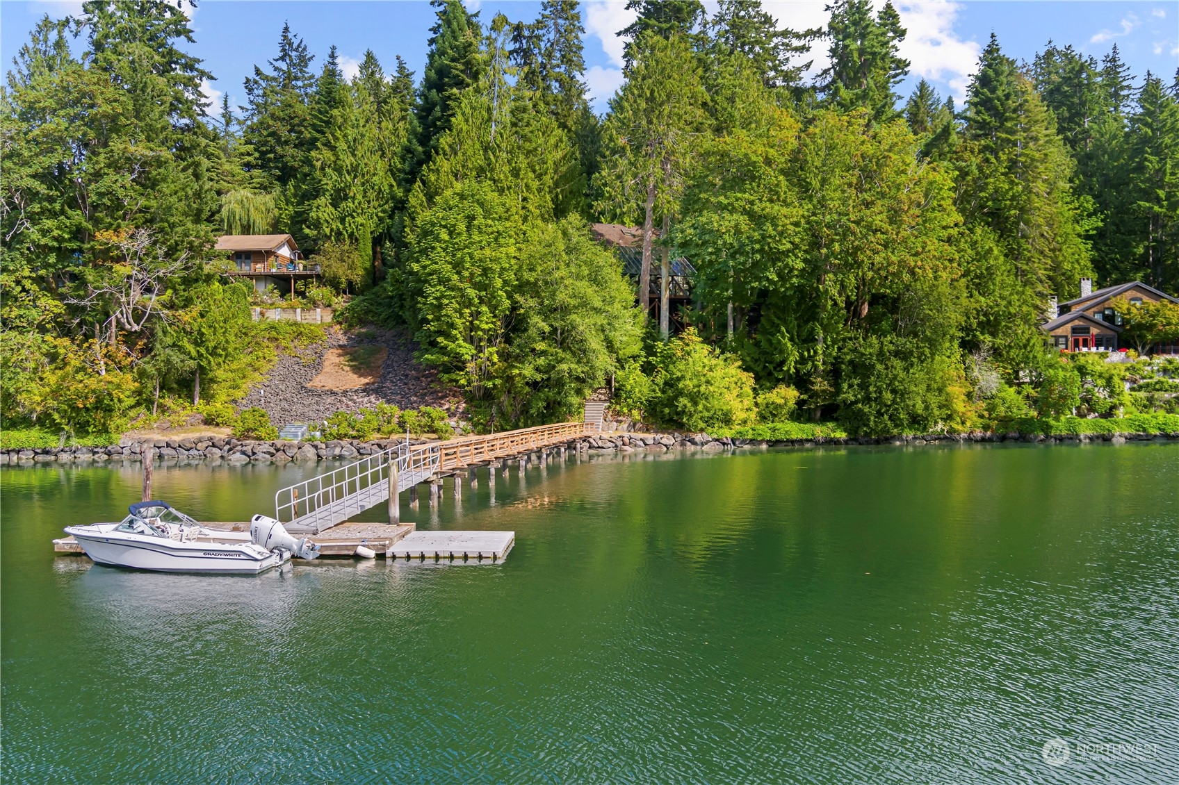 8100 Northeast Hidden Cove Road Bainbridge Island, WA 98110 - Photo 5 of 37 a view of a lake with houses