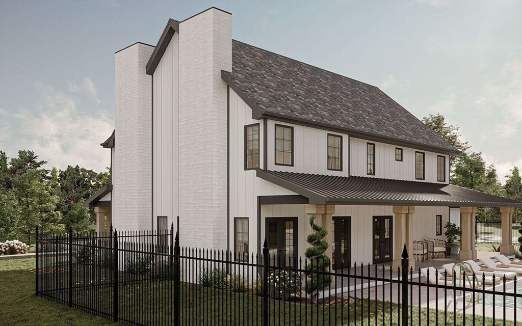 Lot 4 Groton Road Westford, MA 01886 - Photo 3 of 16 a view of a brick house with many windows