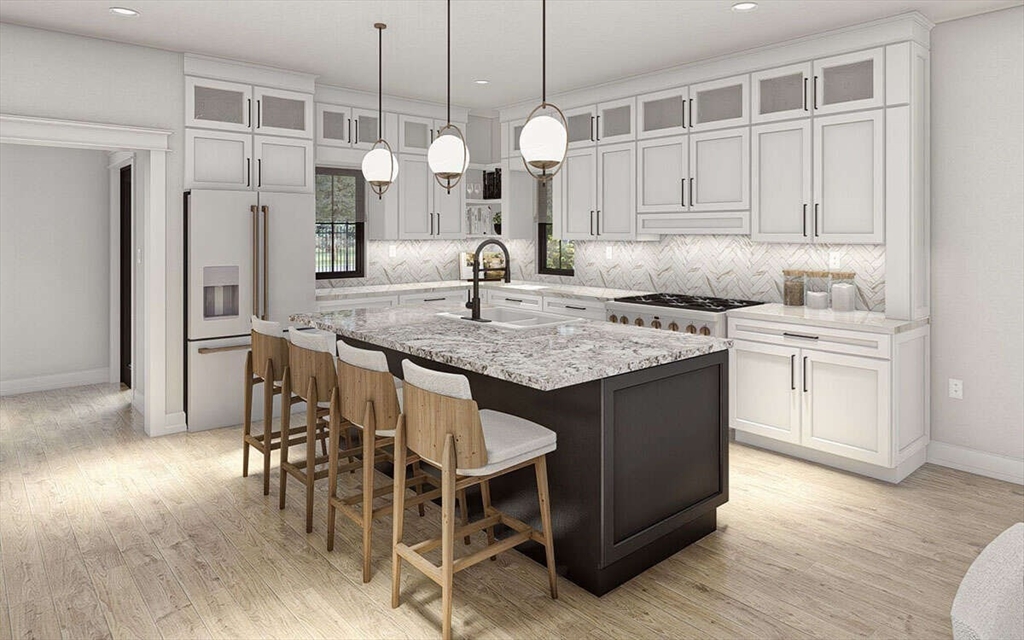 Lot 4 Groton Road Westford, MA 01886 - Photo 8 of 16 a kitchen with a kitchen island white cabinetry and stainless steel appliances