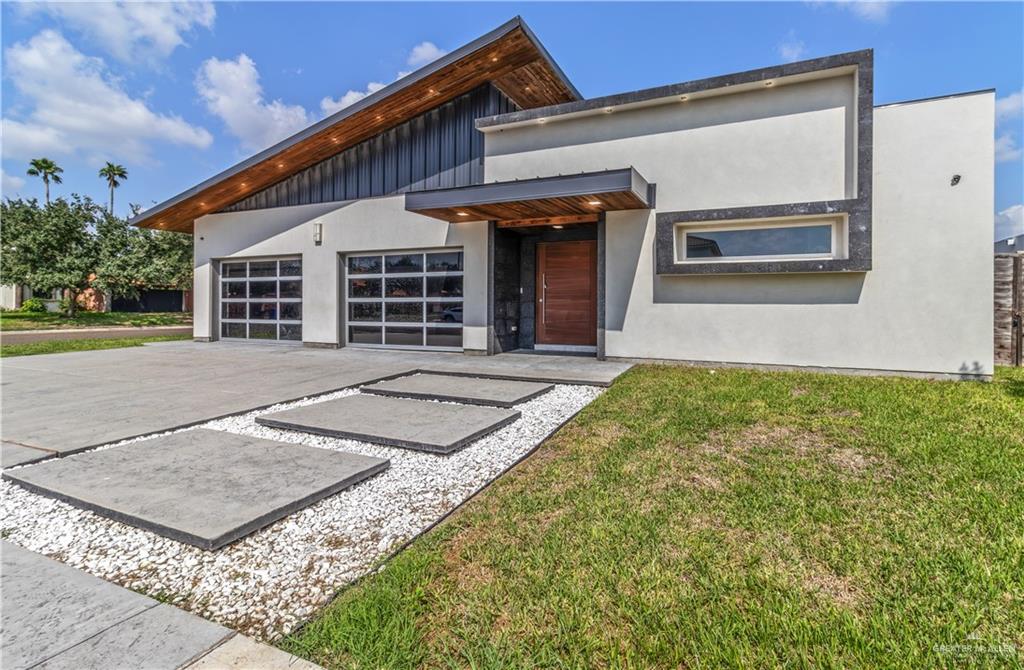 1828 Kilgore Avenue McAllen, TX 78504 - Photo 2 of 21 front view of a house with a yard