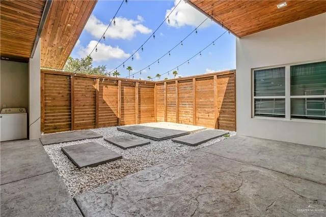 a front view of a house with a large window