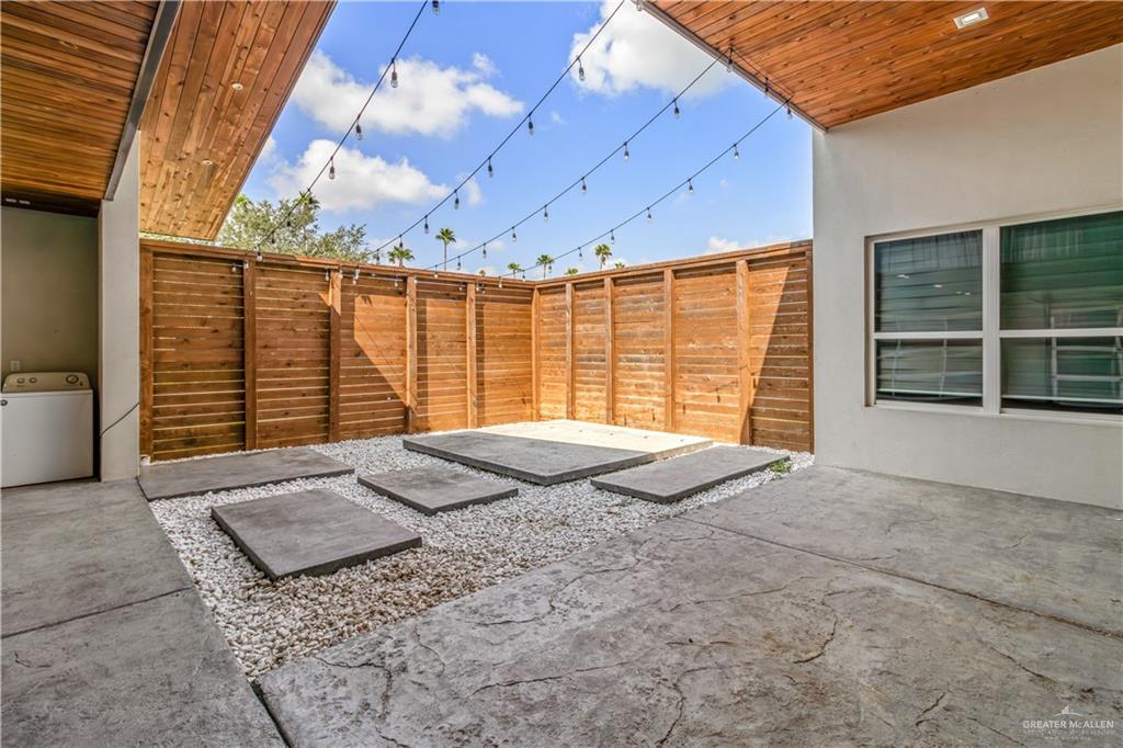 1828 Kilgore Avenue McAllen, TX 78504 - Photo 3 of 21 a front view of a house with a large window