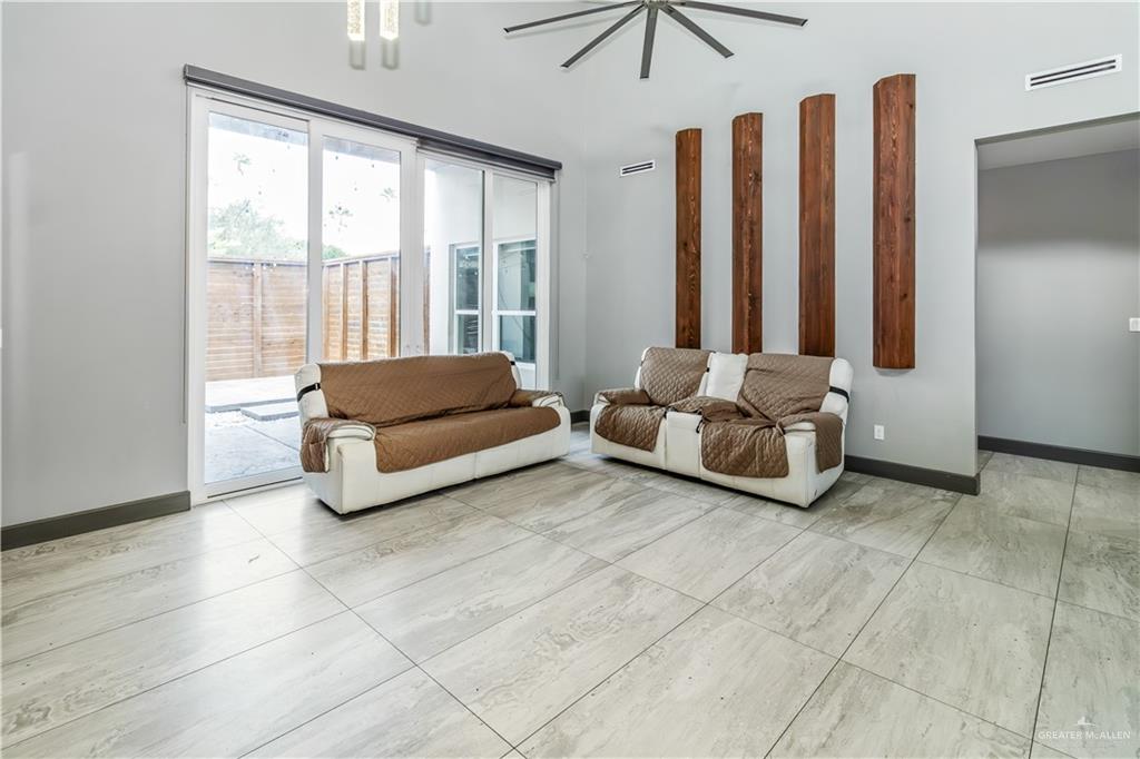 1828 Kilgore Avenue McAllen, TX 78504 - Photo 8 of 21 a living room with furniture and a large window