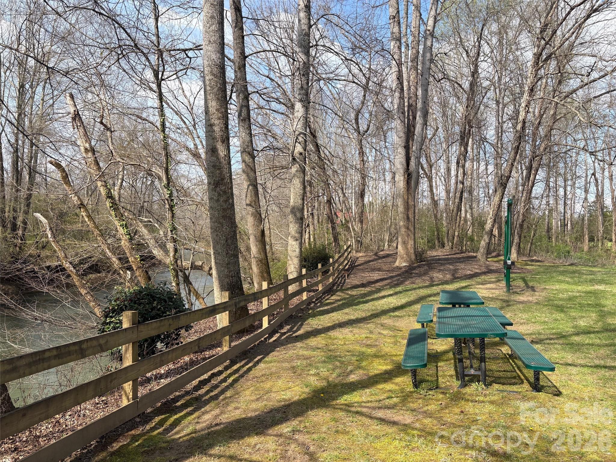 0 Valley Drive, Unit 142 Rutherfordton, NC 28139 - Photo 11 of 15 a view of a swimming pool with a bench