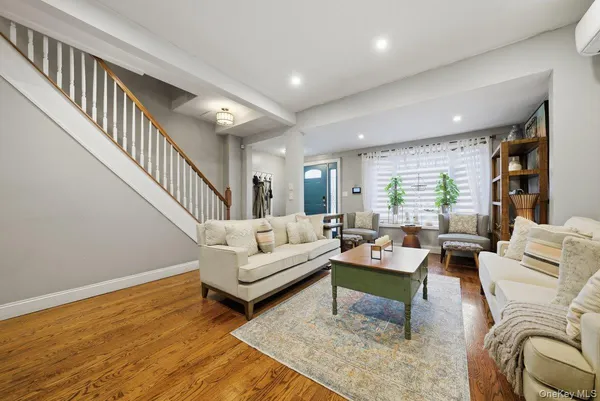 a living room with furniture and a table