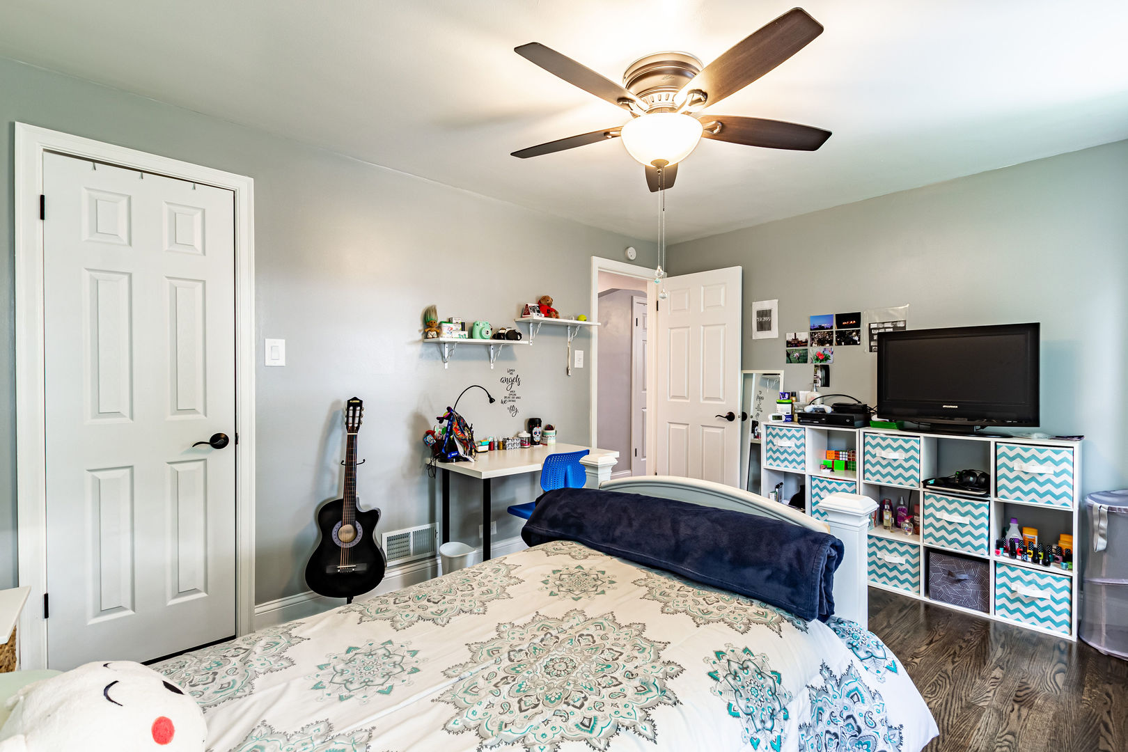 2237 Keystone Avenue North Riverside, IL 60546 - Photo 14 of 40 a bedroom with a bed and a flat screen tv