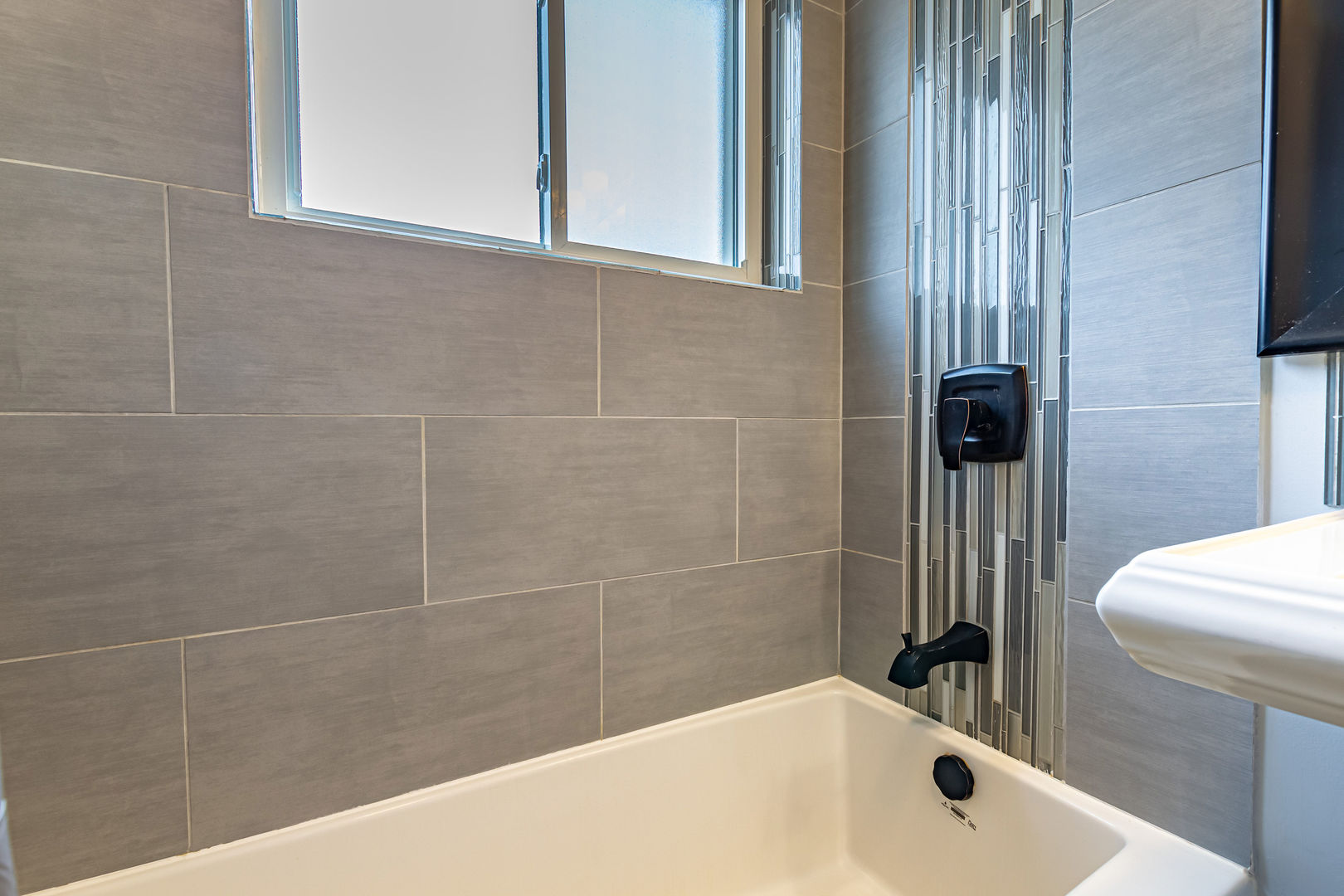 2237 Keystone Avenue North Riverside, IL 60546 - Photo 8 of 40 a bathroom with a bathtub and shower