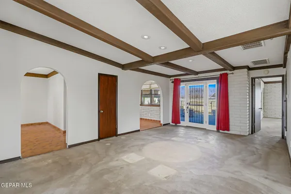 a view of a room with a large window