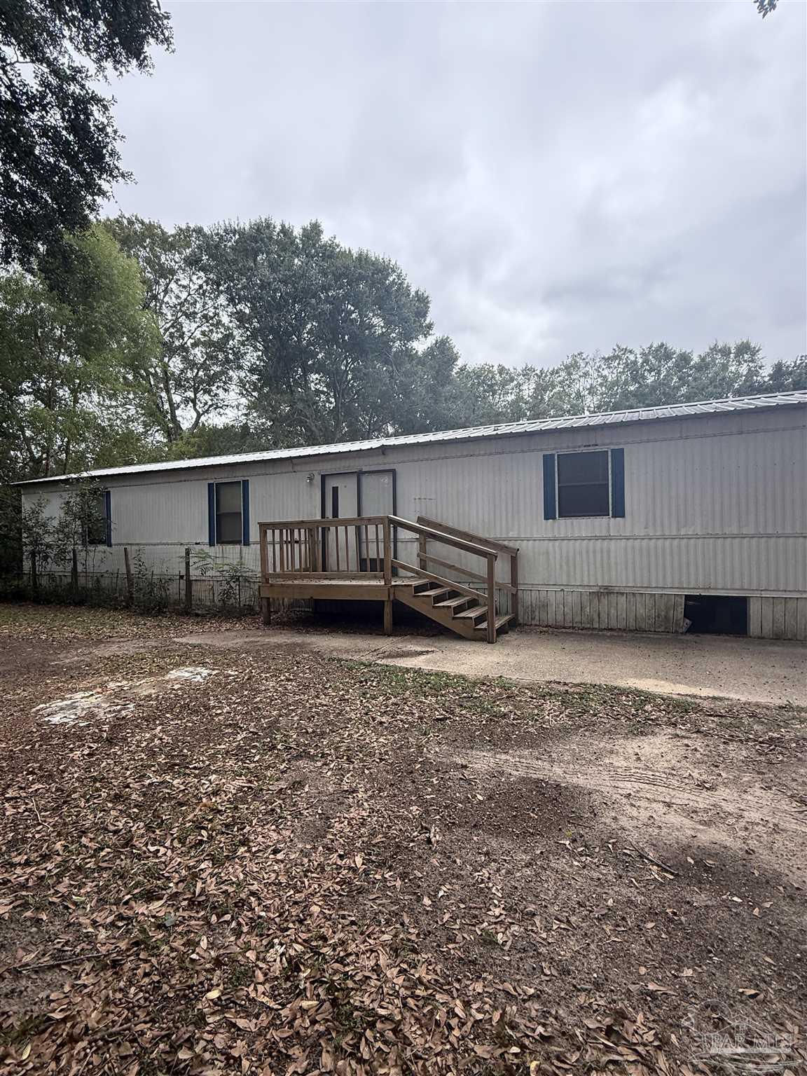 a house view with a garden space