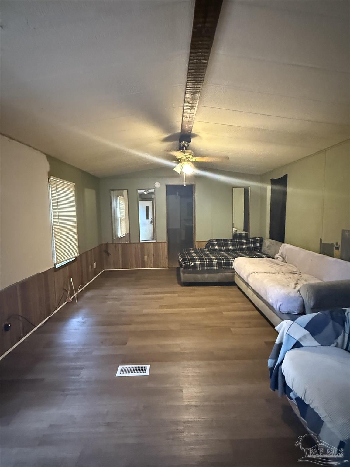 2866 Pine Forest Road, Unit 5 Cantonment, FL 32533 - Photo 7 of 10 a living room with couches and pool table