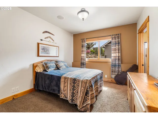 a bed room with a bed and a couch