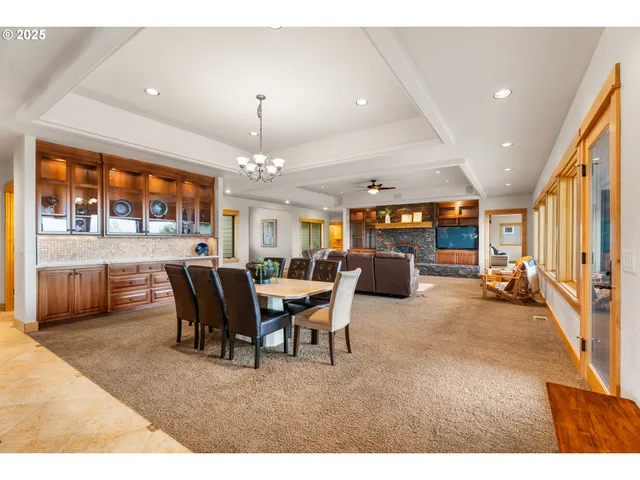 a view of a dining room with furniture window and outside view
