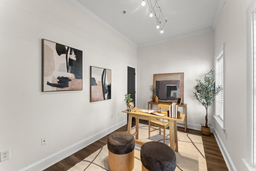 1635 Briarcliff Road Northeast, Unit 8 Atlanta, GA 30306 - Photo 17 of 25 a workspace room with furniture and a potted plant