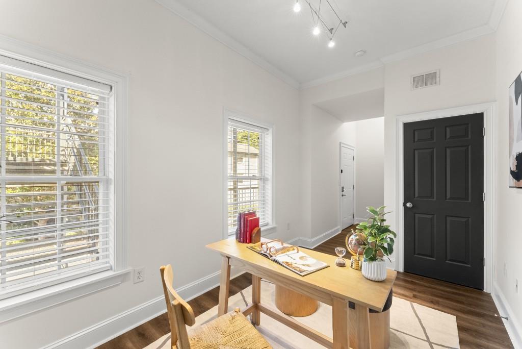 1635 Briarcliff Road Northeast, Unit 8 Atlanta, GA 30306 - Photo 18 of 25 a view of a dining room with furniture window and outside view