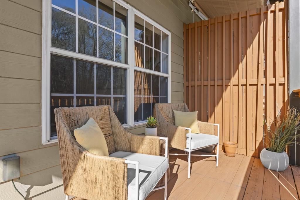1635 Briarcliff Road Northeast, Unit 8 Atlanta, GA 30306 - Photo 20 of 25 a view of a chair and table in the balcony
