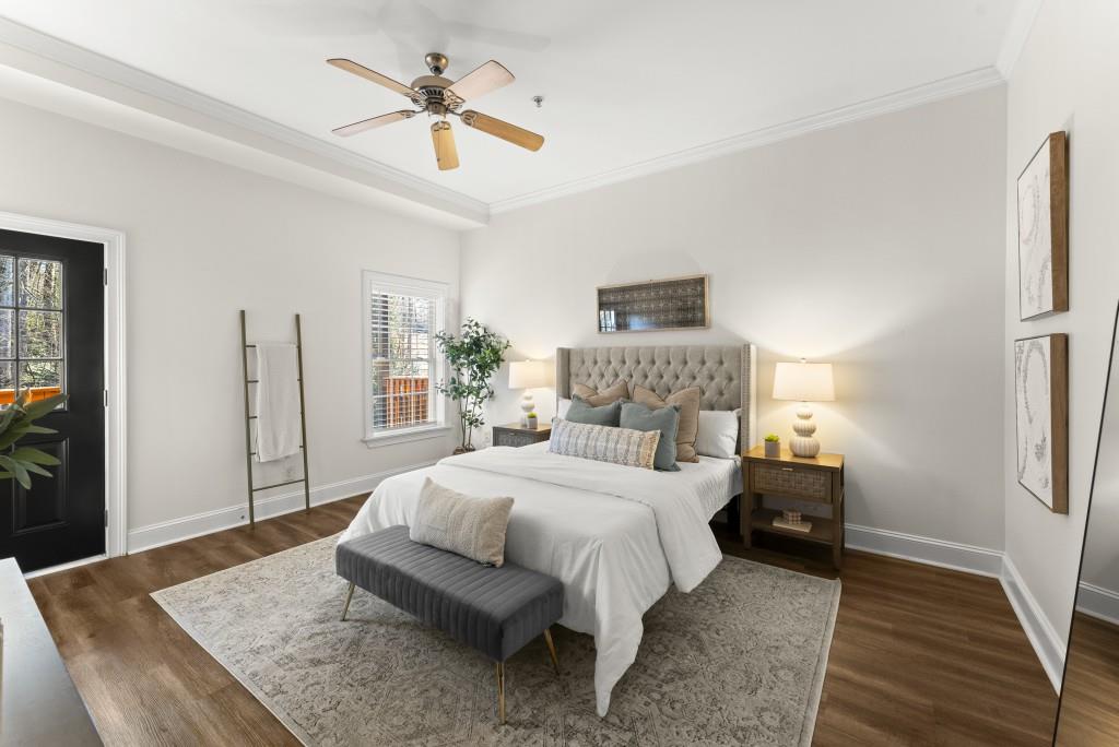 1635 Briarcliff Road Northeast, Unit 8 Atlanta, GA 30306 - Photo 2 of 25 a bedroom with a bed and a table