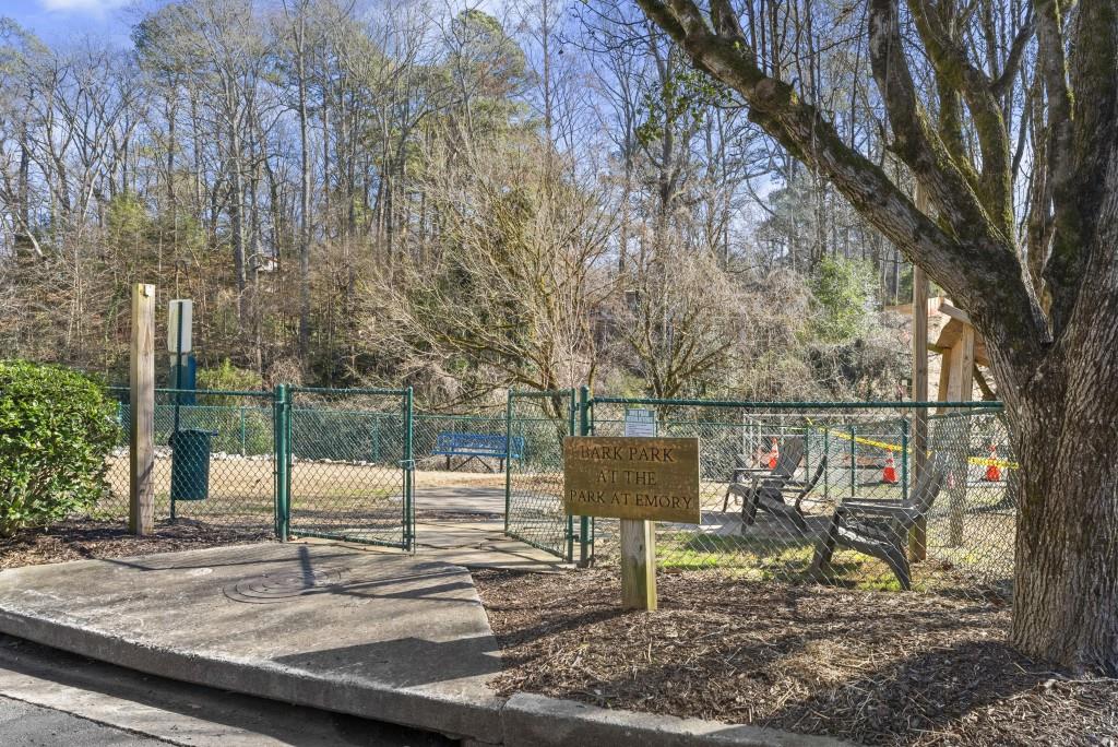 1635 Briarcliff Road Northeast, Unit 8 Atlanta, GA 30306 - Photo 22 of 25 a view of a park that has a tree on the side of the road