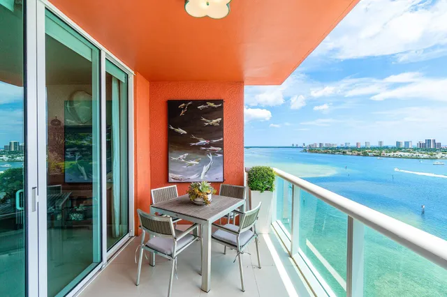 a view of a glass door and a porch