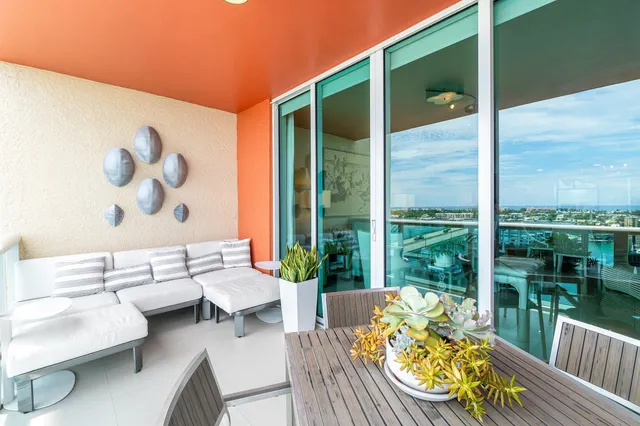 a bathroom with a double vanity sink mirror and shower