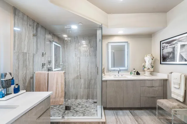 a kitchen with kitchen island a sink and refrigerator