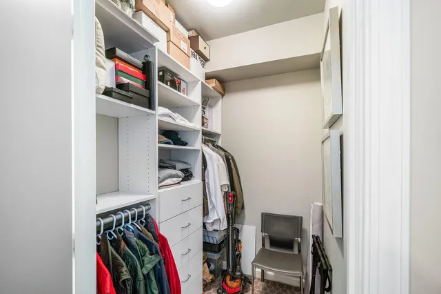 an aerial view of a house with a swimming pool