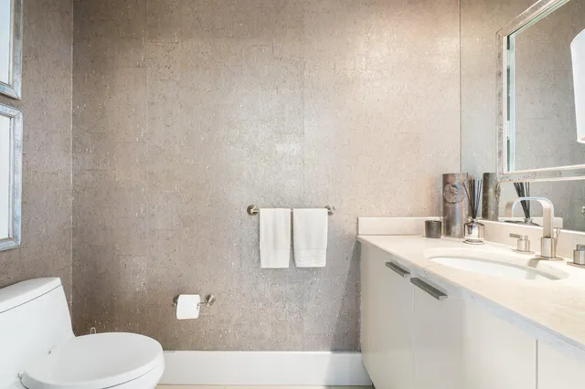 a view of a patio with a table and chairs