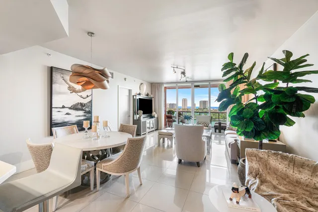 a kitchen with stainless steel appliances granite countertop a sink and stove top oven