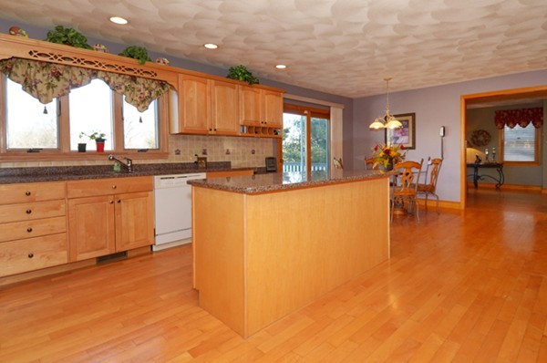 201 Andover Street Georgetown, MA 01833 - Photo 11 of 30 a large kitchen with lots of counter space and a sink
