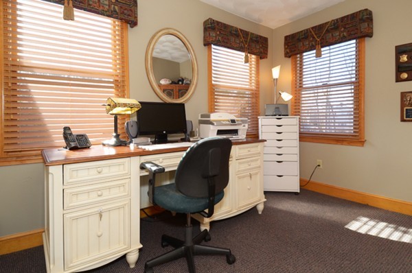 201 Andover Street Georgetown, MA 01833 - Photo 17 of 30 a view of a workspace with furniture and a window