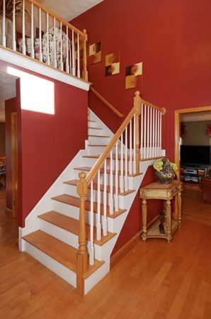 201 Andover Street Georgetown, MA 01833 - Photo 19 of 30 a view of a house with staircase and a floor to ceiling window