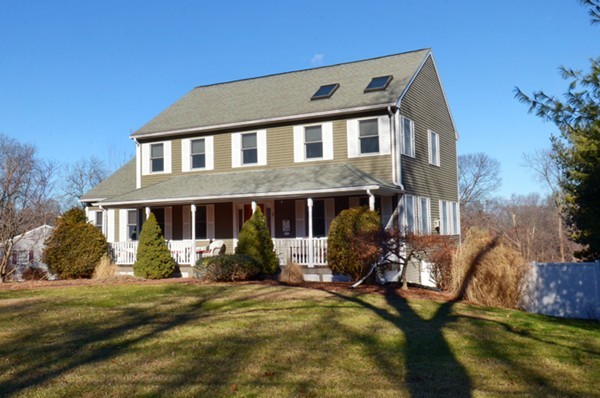 201 Andover Street Georgetown, MA 01833 - Photo 2 of 30 a front view of a house with garden